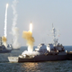 Illustration for article titled This Chase Planes View Of A Tomahawk Striking A Ship Is Incredible